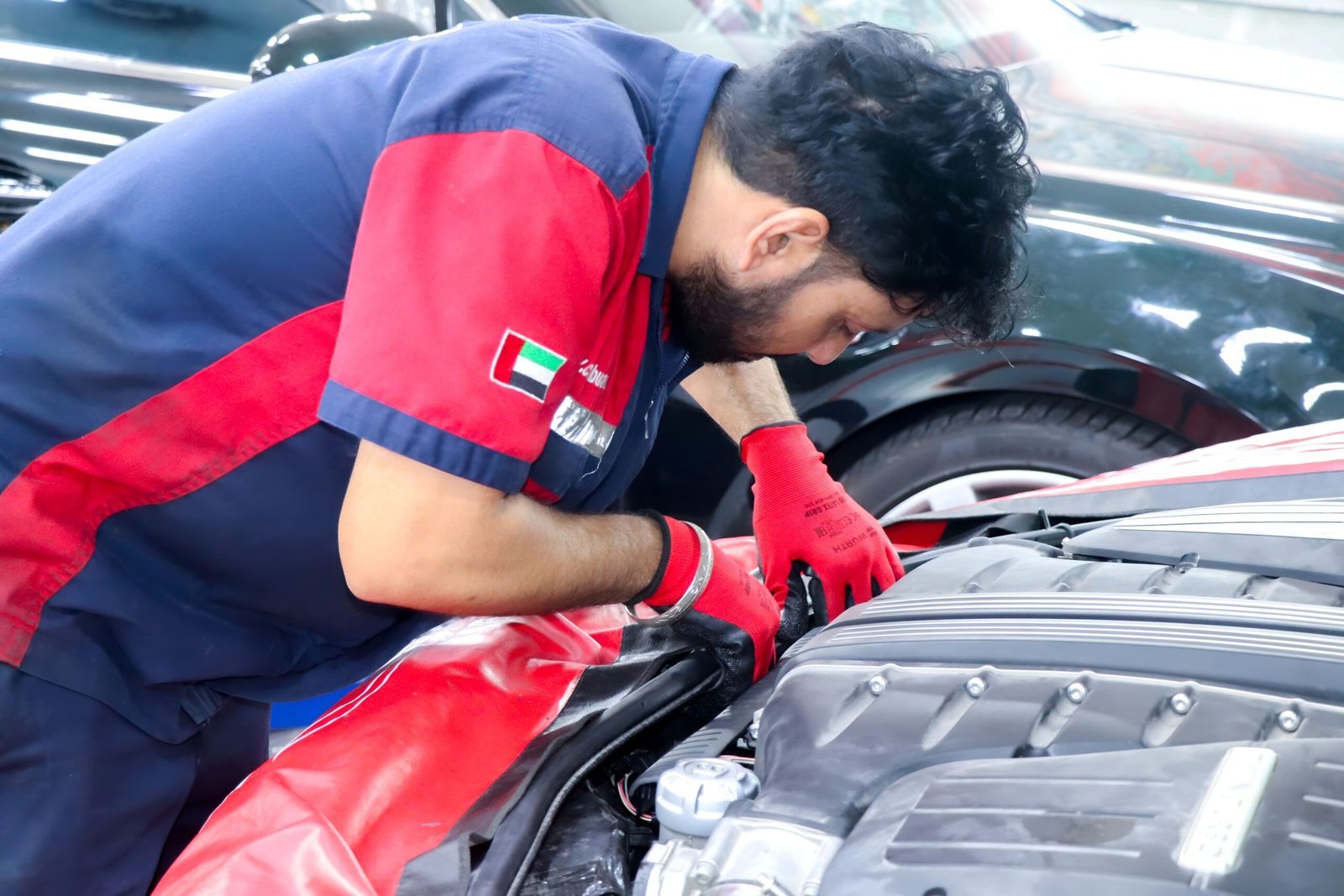 Mechanic working on car